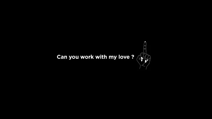 Sur fond noir : Can you work with my love ? et un dessin de main.