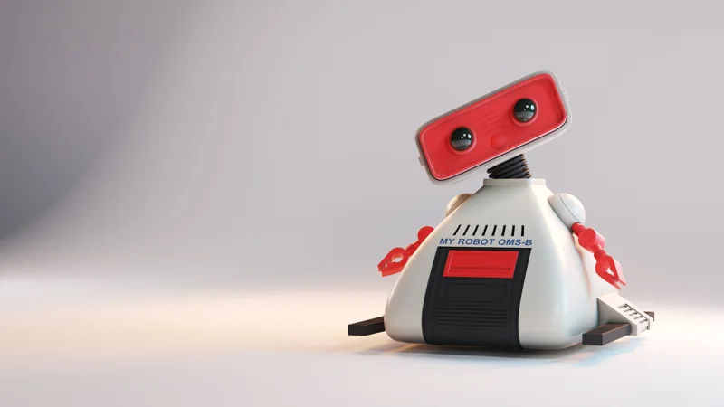 Petit robot blanc et rouge.